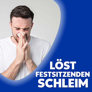 Ein Mann putzt sich angestrengt die Nase. Der Text sagt: Löst festsitzenden Schleim.