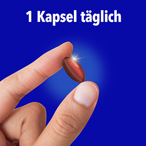 Eine Bion3 Kapsel wird zwischen zwei Fingern gehalten, um die einfache tägliche Einnahme zu zeigen.