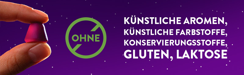 Ein WICK ZzzQuil Gute Nacht Weichgummi mit Mango- und Bananengeschmack wird gezeigt. Der Text daneben sagt: ohne künstliche Aromen, künstliche Farbstoffe, Konservierungsstroffe, Gluten und Laktose