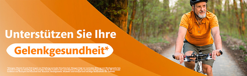 Mann zufrieden lächelnd auf einem Fahrrad im Wald. Text sagt: Unterstützen Sie Ihre Gelenkgesundheit